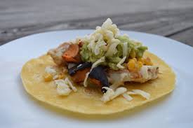 A hybrid striped bass (a.k.a. Striped Bass Roasted Vegetable Tacos