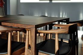 It's rectangular top is made of wide planks of solid reclaimed wood with a distressed finish in brown shades. 10 Seater Oak Dining Table