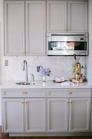 Look We Love Gray Kitchen Cabinets With Brass Hardware Home Kitchens Grey Kitchen Cabinets Kitchen Inspirations