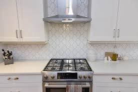 See what pat hawkins (hawkpat7) has discovered on pinterest, the world's biggest collection of ideas. White Shaker Kitchen Cabinet With Arabesque Gloss Tile Backsplash White Shaker Kitchen White Shaker Kitchen Cabinets Shaker Kitchen