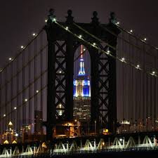 Gary Hershorn On Instagram Nighttime Version Of The Empirestatebldg Lit As A Flickering Candle For Hanu Manhattan Bridge New York City Empire State Building