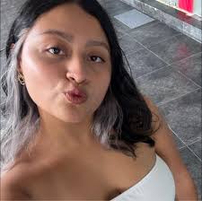 Horror movie characters sitting in the back of an ambulance after almost  dying