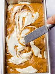 This easy pumpkin bread recipe scented with orange and filled with chocolate is a winner. Pumpkin Chocolate Chip Bread With Cream Cheese Swirls Drive Me Hungry