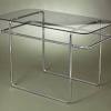 Set of laccio side tables and one coffee table by marcel breuer. 1