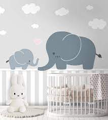 A set of prints of elephants in the night sky, with moon and stars, a dreamy addition to your nursery. Tapete Fototapete Kinderzimmer Elefanten Familie Wolken Etsy In 2021 Striped Wallpaper Nursery Nursery Baby Room Nursery Wallpaper