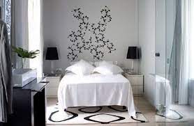 The black and white colors create layering and depth. 40 Design Ideas To Make Your Small Bedroom Look Bigger