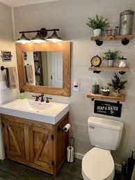 These farmhouse bathroom design ideas are sure to win over every guest that comes into your home! Farmhouse Bathroom Industrial Meets Modern Look This Is Similar To How We Want Out Bathroom T Small Bathroom Remodel Farmhouse Bathroom Decor Bathroom Design