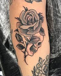 Skull And Rose Tattoo Skull Rose Tattoos Tattoos Rose Tattoos