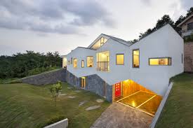 Without a doubt, modern house design has a nice intuitive style. Cool Modern House With A Slide And Bookshelf Stairs Design Milk