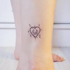 Small heart tattoo on ring finger and star on wrist looking awesome. Stars Heart Moon Tattoo Romantic Tattoo Delicate Tattoo Arrow Tattoos