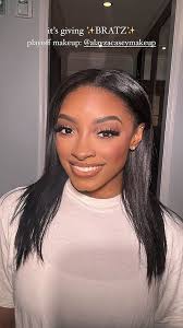 Simone Biles is NFL playoff ready as she shows off her 'Mrs Owens' jacket  and makeup ahead of watching her Green Bay Packers husband Jonathan take