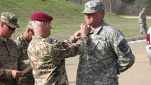 He was a navy seal. Military Members Find Challenge In College Football As Walk On Players