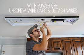 Fluorescent ceiling lights are found in an increasing number of homes due to their energy efficiency and long life. How To Replace Fluorescent Lighting With A Pendant Fixture Young House Love
