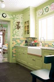 Can You Guess What Inspired This Kitchen S Decor Green Kitchen Cabinets Kitchen Cabinet Design Kitchen Colors