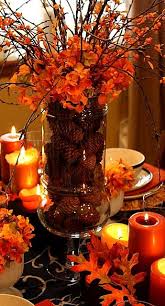 Leaves And Orange Candles Make For The Perfect Intimate Thanksgiving Table Setting Fall Table Centerpieces Fall Table Decor Fall Centerpiece