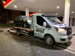 Should i transport my classic car on an open or enclosed transport carrier? Classic Car Transport Essex Dmt Recovery