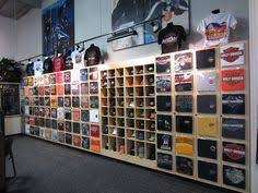 Use a light backdrop, bright lighting, and lots of different angles to capture the colors and details of each garment. 13 Tshirt Display Ideas Tshirt Display Shirt Display Store Displays