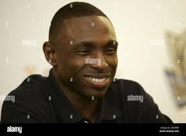 New Dallas Mavericks head coach Avery Johnson, who retired as a player in  2004 attends a news conference in Dallas, Saturday, March 19, 2005, where  Don Nelson resigned as head coach handing