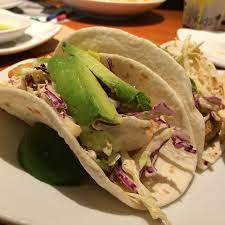 In a medium bowl, whisk together the flour, cornstarch, chili powder, baking powder, cayenne. Fish Tacos California Pizza Kitchen At Oakridge Mall