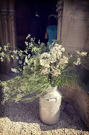Look for natural wood, tin, or barrel style containers filled with hydrangeas, daisies, thistle and straw flower. Our Rustic Country Wedding A Church Full Of Cow Parsley The Natural Wedding Company The Natural Wedding Company