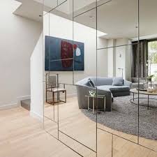 Fantastic way of making a bold statement, adding a touch of drama, increasing the size of a room and bouncing light. Making Mirrored Walls Modern Seven Ideas To Steal Apartment Therapy