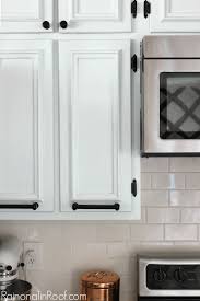 Grab your filler and cabinet door you want to fill, turn over the cabinet door and start to apply the filler from the back side of the cabinet. How To Cover Old Hardware Holes