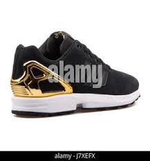 Adidas ZX Flux W Damen Sneakers von Schwarz und Gold - B35319  Stockfotografie - Alamy