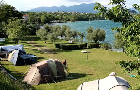 Camping With A Beach On Lago Di Garda The Campsite With Pitches For Tents In Manerba Del Garda Camping Village San Gi Camping Lake Garda Lake Garda Campsite