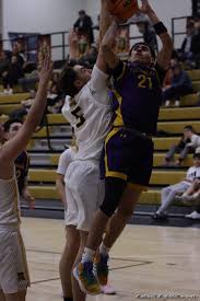 Raton Varsity Boys Take Win in Overtime