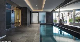 Is This The Most Peaceful Home In The World Gorgeous Mansion On Shore Of Lake Geneva Goes Indoor Swimming Pool Design Indoor Swimming Pools Indoor Pool Design