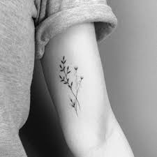 So, without further ado, here is a list of 8 cute and dainty tattoo ideas! 15 Dainty And Subtle Flower Twig Tattoos By Lara Maju Tattoos Trendy Tattoos Line Tattoos