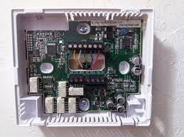 The 18 refers to the gauge and the 5 refers to how many individual wires are inside i think the blue wire in the diagram comes out as the red wire to the thermostat. Carrier Comfort Choice Thermostat