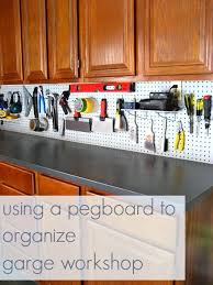 Organizing Our Garage With Old Kitchen Cabinets And A Pegboard Clean Kitchen Cabinets Old Kitchen Cabinets Garage Organization