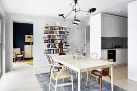 With a light blush pink wall color and a surrounding gallery of eclectic artwork, the small room packs a lot of punch. Ikea Small Space Design Tricks Stylists Swear By