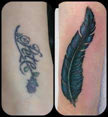 Dagger & rose what the heck is the original tattoo of, a torn up and scabbed knee?! The Twisted Jester On Twitter Name Cover Up With A Colourful Feather By Dave Feather Forearm Tattoo Https T Co Jvdbrwcaef