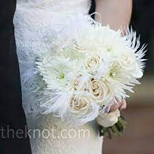 A wide variety of confetti bouquet options. Posh Bridal Bouquet Comprised Of White Roses White Spider Mums White Feathers Flower Centerpieces Wedding Rose Wedding Bouquet Wedding Bouquets