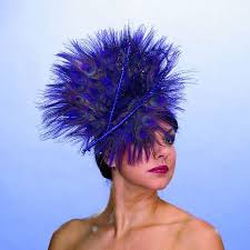 As for wedding hair updos, a low loop would be a nice choice, especially when you have bangs. Tips For Choosing Wedding Hats And Fascinators