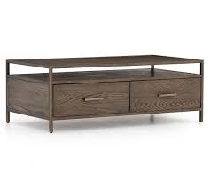I have loved our coffee table (and reviewed it here) but i'm craving a small change. Modern 48 Oak Coffee Table Pottery Barn