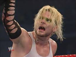 Jeff in disbelief since he lost the match against the Undertaker that he'd  have him raise his hand