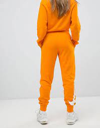 Nike - Exclusivité ASOS - Pantalon de jogging - Orange | ASOS