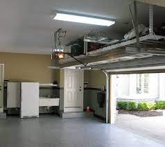 19 Garage Organization And Diy Storage Ideas Hints And Tips Garage Ceiling Storage Overhead Garage Storage Garage Storage Solutions