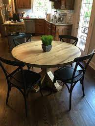 Pair this table with matching chairs from this collection to complete your dining ensemble. Reclaimed Wood Round Table This Table Is 48 Inch Round But Can Be Made Any Size And S Round Kitchen Table Refurbished Kitchen Tables Circular Kitchen Table