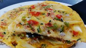 Loaded with your favorite meats and vegetables, these omelets are sure to satisfy. French Fries Omelette Recipe Chips Mayai Breakfast Ideas Cooking Recipe Tasty Food Recipes