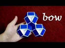 Those numbers will allow you to locate the same cubes on the next picture by looking the red numbers. Smiggle Snake Puzzle Or Rubik S Twist 24 Bow Youtube