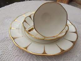 Maybe you would like to learn more about one of these? Stunning Vintage Art Decor Style Royal Vale Gold And White Bone China Trio Tea Set Lovely Design With Gold And White Daisy Pattern Tea Cups Tea China Tea Cups