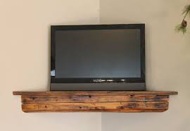 Pin By Mary Bartels On Decor Corner Mounted Tv Ideas Barn Beams Wall Mounted Tv