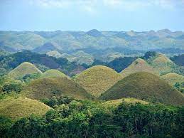 These green hills that turn brown during the summer months will remind you of hershey's kisses, hence the name. Datei Chocolate Hills Overview Jpg Wikipedia