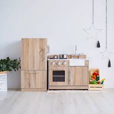 This play kitchen is chrome and dark wood, reminiscent of gourmet kitchens found in today's homes. Teamson Kids Little Chef Chelsea Play Kitchen Set Wayfair Ca Play Kitchen Sets Play Kitchen Kids Play Kitchen