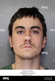 This booking photo provided by the Syracuse, N.Y., Police Department shows  Ryan Lawrence, who is charged in the death of his 21-month-old daughter  Maddox Lawrence. Police in Syracuse say divers have recovered