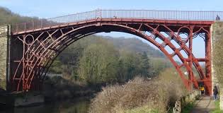 There is a wood bridge there now, (20 years old) 7 sets of 5 2x8x15' boards bolted together w/ cross boards on top connecting them all and runners on top to drive on. The Iron Bridge Wikipedia